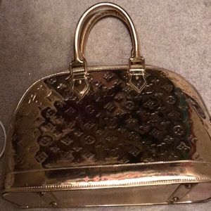 Metallic gold Louis Vuitton  purse
